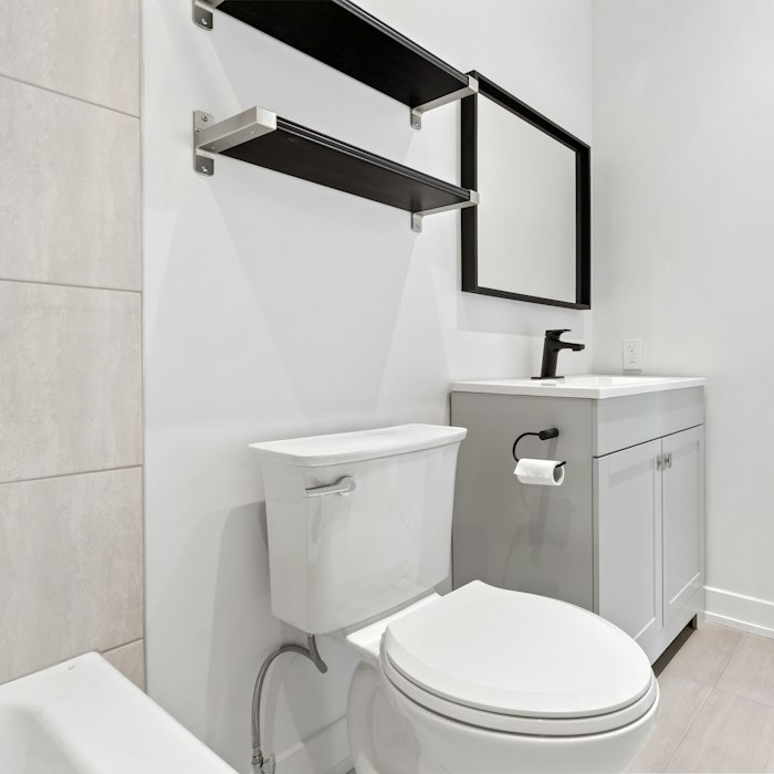 Toilet pan relocated during bathroom layout change