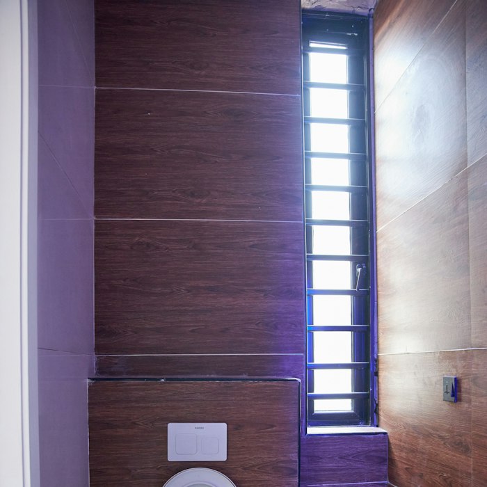 Wall faced toilet installed in a Gold Coast bathroom
